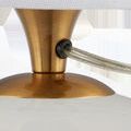Detail of transparent power cord emerging from antique brass neck above crystal base