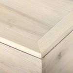 Light-washed poplar wood sections with natural variations in grain and color displayed in four quadrants
