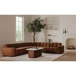 Dash coffee table shown nested with matching smaller table in bright room with fireplace and potted tree