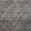 Wade Midnight / Beige Rug with abstract linear motifs, distressed earth-tone pattern in dark and beige hues, fringed edges