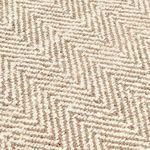 Close-up texture showing handspun jute fibers arranged in a detailed Chevron pattern