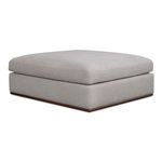 Rue Ottoman angled from opposite side highlighting plush cushion and smooth fabric texture