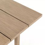 Close-up on the gap between two top wooden slats and the square edge finish
