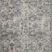 Rectangular contemporary rug in charcoal and silver with distressed abstract floral pattern, 9 by 12 feet