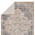 Backside of Lynette rug flipped to reveal woven texture and edge stitching