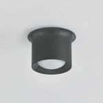 Noxon flush mount ceiling light with matte cloud glass shade and dark metal frame flowing into the ceiling