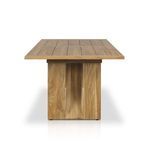 Overhead view focusing on interlocking plank design and framed tabletop edges
