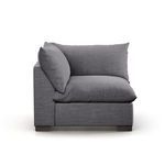 Side view with slightly different lighting showing cushion depth and armrest
