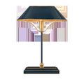 Front view of lamp lit, showing warm glow illuminating gold interior of shade and brass fixture