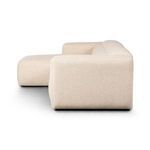 Side profile of sectional highlighting smooth fabric texture and clean straight lines on armrest