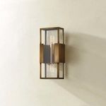Santa Clara wall sconce mounted on a light beige wall casting soft shadows