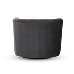 Side detail shot focusing on rounded armrest and smooth fabric