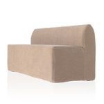 Side angle detail of dome-shaped backrest with minimal slipcover wrinkles