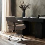 Henrik Desk Chair styled in a modern home office with light streaming through sheer curtains