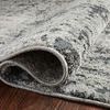 Close-up of thick, folded edge showing texture and backing of Austen Pebble / Charcoal Rug