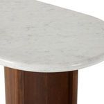 Close-up of rounded corner of marble surface showing gentle curve and polished finish