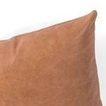 Close-up of tan leather top panel showing smooth texture and stitching details