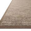 close-up low angle showing two-level pile texture and brown border binding