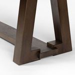 Close-up on Silverton Dining Table A-frame leg connection to stretcher base