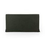 Close-up showing corner edge of slipcover with neat stitching and fold details