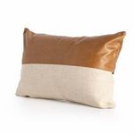 Rear angled view emphasizing leather and linen two-tone fabric and pillow shape