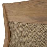 Close-up of woven natural teak texture on chair’s back panel