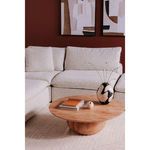Styled in a living room with light beige sectional sofa, off-white rug, and decorative vase with flowers on table