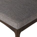 Detailed view of chair seat upholstery and frame joinery on Abida Alcala Nickel Dining Chair