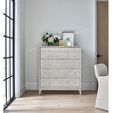 Chest styled in bright room corner with flowers and art on top, next to neutral upholstered chair
