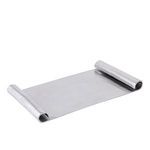 Angled view showing curled scroll edges and flat tray surface with subtle metallic sheen