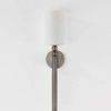 Lakeport Wall Sconce front view showing round wall mount and cylindrical white shade