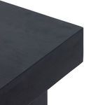 Close-up of squared edge detail on black wash mango wood desk top showing smooth finish