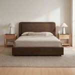 Simon Storage Bed styled in bright room with beige bedding, light wooden nightstands, and textured rug