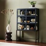 Close-up of textured black oak wood with vertical grain on Spencer Curio Cabinet doors