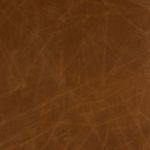 Close-up of leather texture showing its soft vintage patina and natural grain