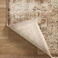 Back corner of Sorrento Mocha rug lifted to show weave underside on wood flooring
