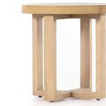 Close-up showing natural wood grain across the wide rounded tabletop surface