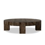 Large round coffee table in dark rustic oak veneer with thick top, chunky squared legs, and dovetail joinery