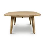 Narrow view of the table from the short side, showing leg positioning and oval edges