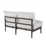 Rear angle emphasizing the open frame design and white back cushions