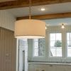 Evelyn 19-inch hanging shade with white pleated fabric in kitchen setting