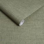 Close-up of wallpaper roll displaying its woven texture and rolled edge