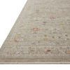 Close-up angled view showing Ida Spa Multi Rug’s faded vintage pattern and edge detailing