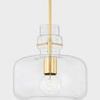 Close-up side angle of Lumi Pendant showing brass pins on glass and exposed filament bulb
