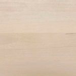 Close-up of light natural mango wood finish showcasing subtle wood grain texture