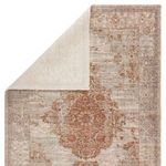 Turned edge of the rug reveals neat sewn binding