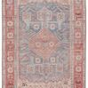 Top-down view showing full rectangular shape and detailed color contrast of pink and blue within the medallion and border