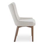 Side profile of Posta dining chair highlighting seat cushion thickness and leg angle