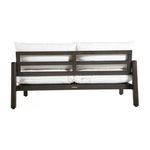 Back view of sofa showing twin horizontal slats in dark aluminum frame with white cushions
