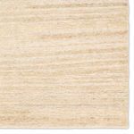Top-down close crop focusing on the detailed striped texture and natural color variations on Kazbek rug